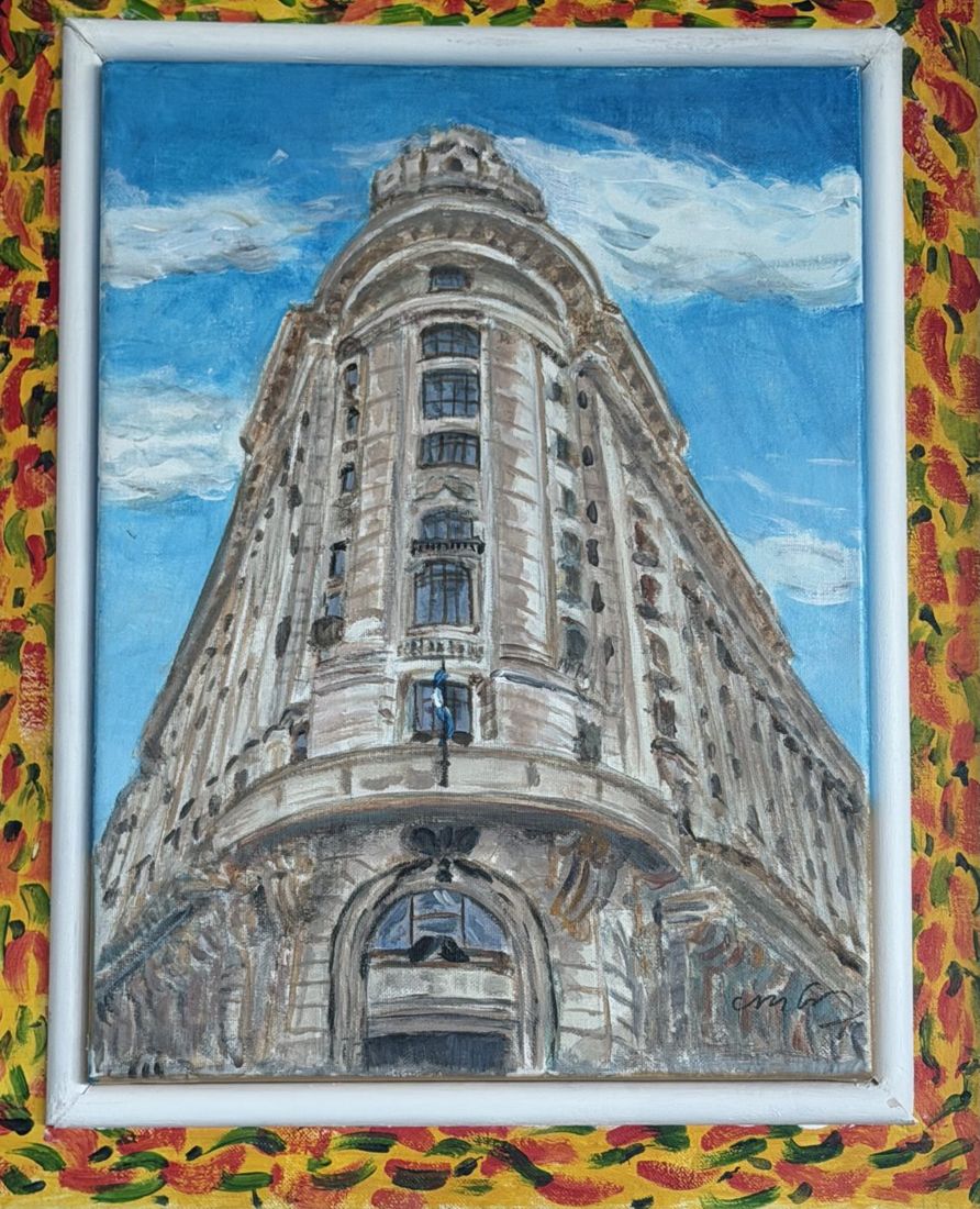 Painting of an ornate corner building against a blue sky, with a painted border